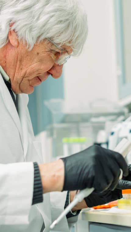 A researcher working at the Hill's Pet Global Pet Nutrition Center